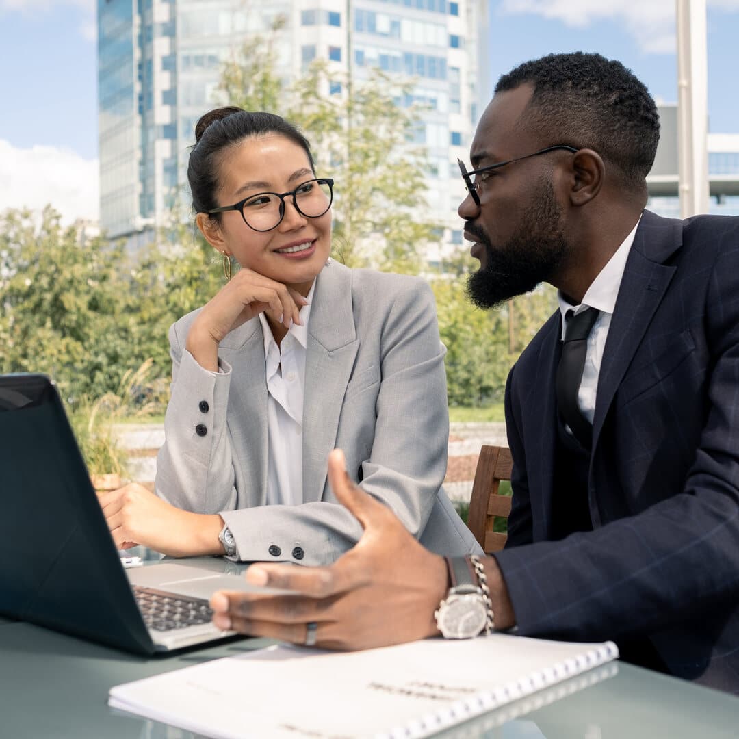 Two business partners discussing new strategies and ideas